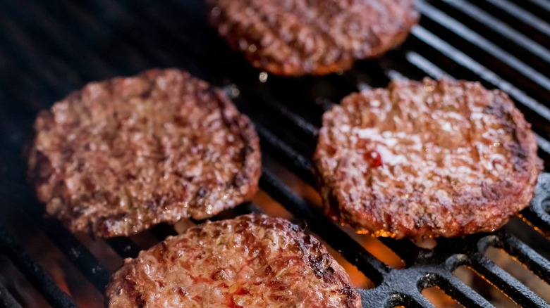 hamburger patties on the grill