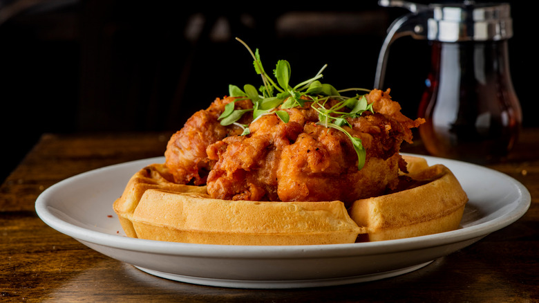 chicken and waffles on plate