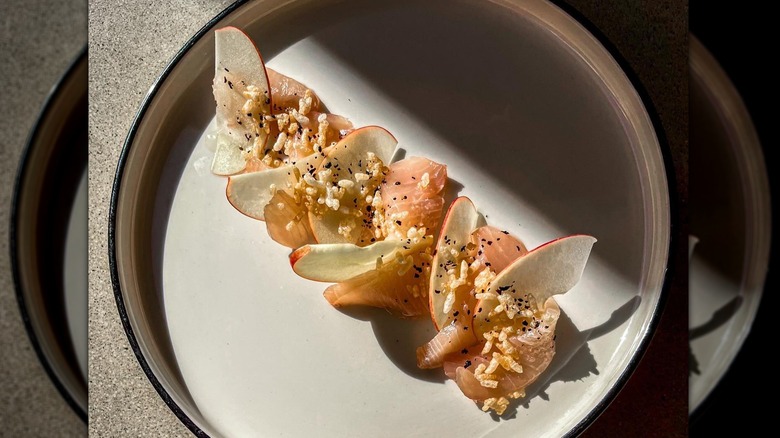 Crudo plate with apple slices