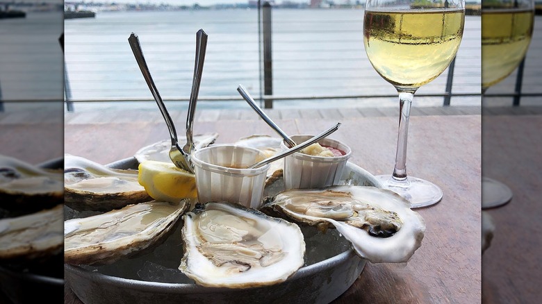 Plate of oysters with wine