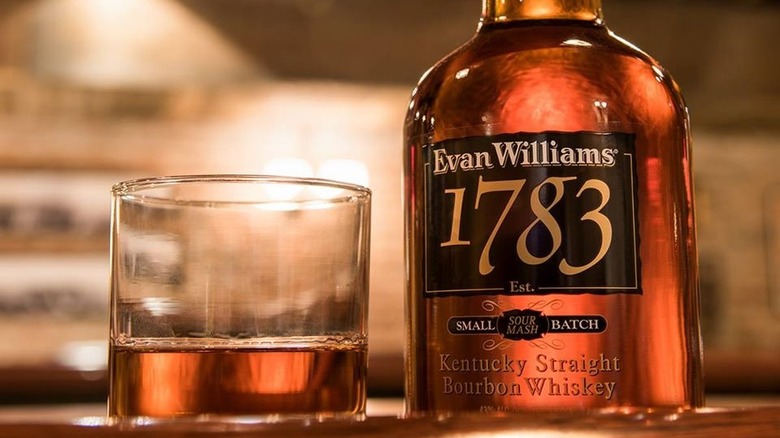 Evan Williams 1783 bottle and glass