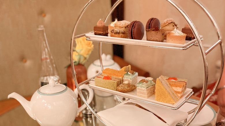 afternoon tea set and tea pot on table