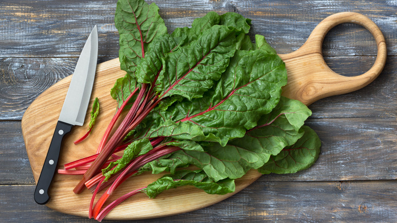 Chard leaves on cutting board