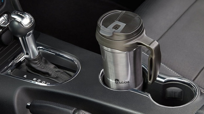 Bubba Hero travel mug in a car cup holder