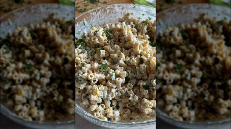 Mexican street corn pasta salad in a glass mixing bowl