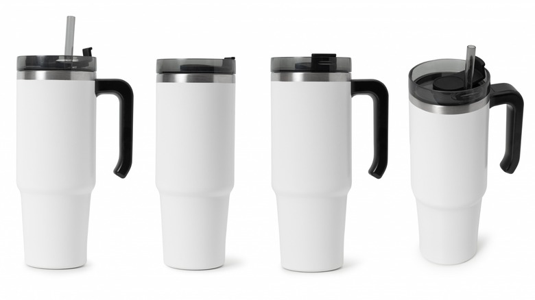 white tumblers black lids