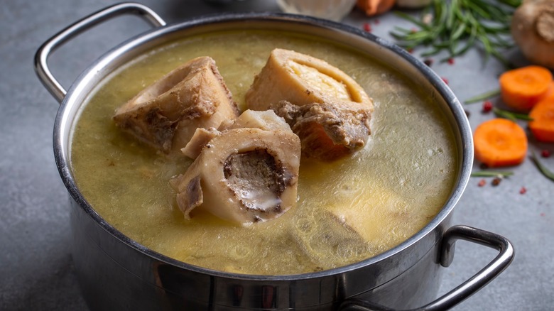 Homemade beef bone broth in a pot