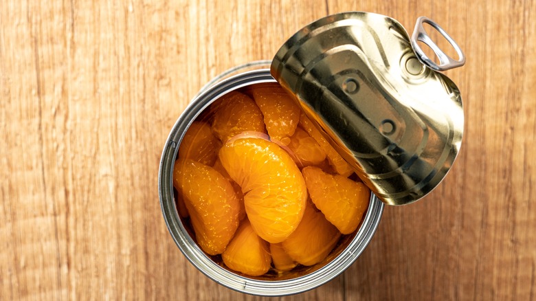 Open canned of mandarin oranges 