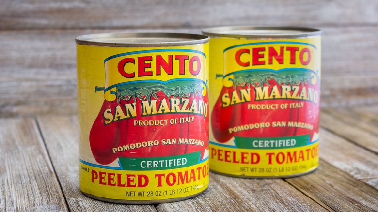 Two San Marzano tomato cans