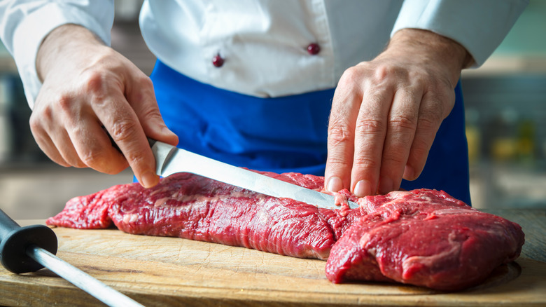 Cutting large cut of beef