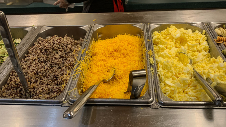 Breakfast buffet trays with signs of cross contamination