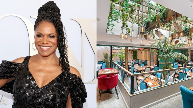 Audra McDonald smiling, skylit dining room