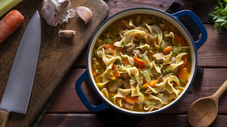 Pasta stew crockpot and cutting board