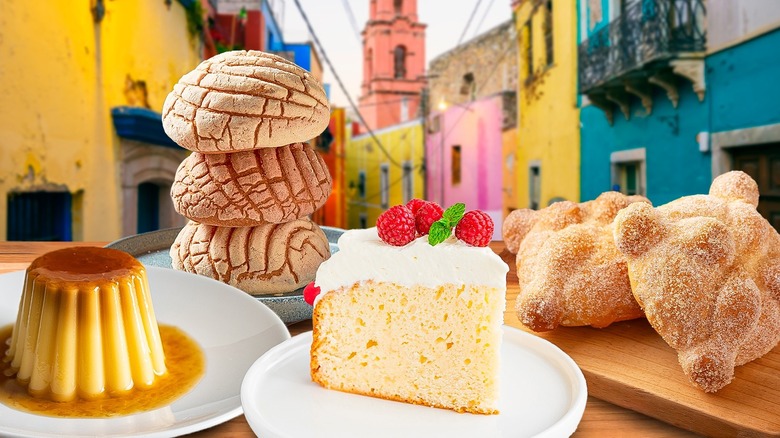 Mexican desserts on a table in front of a city street