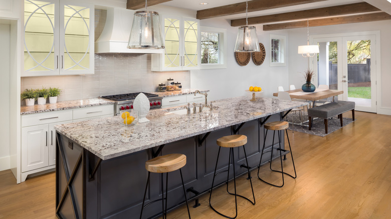 Kitchen with several frosted glass cabinets