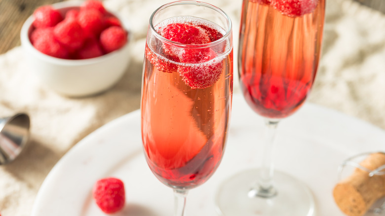 Kir Royale Cocktail with raspberries