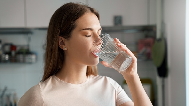 person drinking water