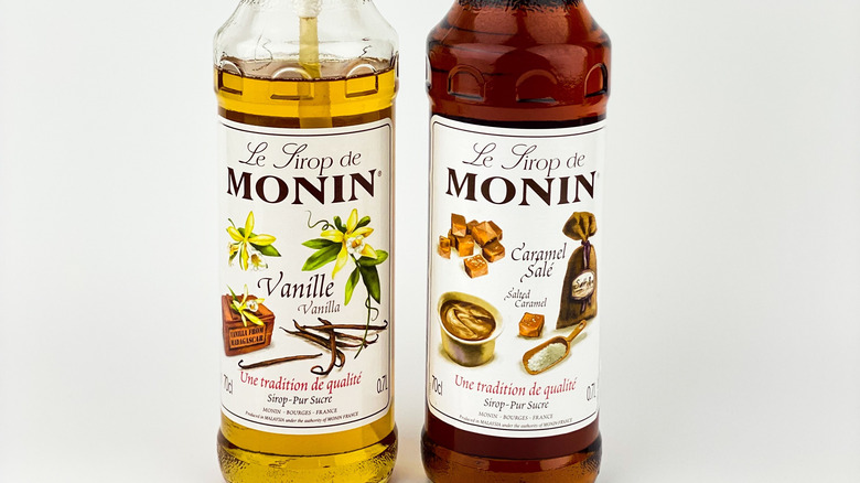 Two bottles of Monin syrup