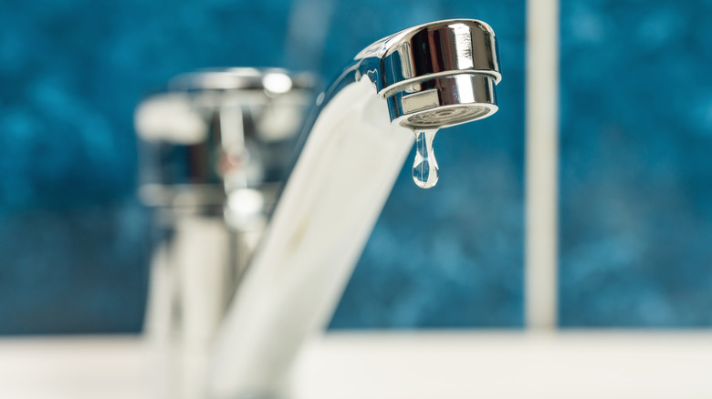 Water dripping from a faucet