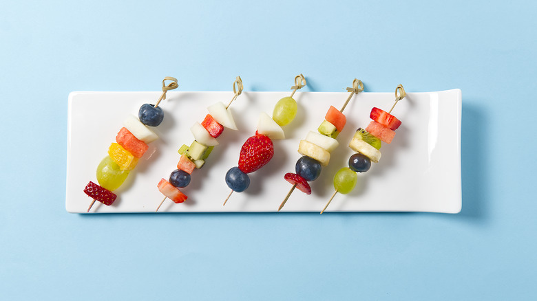 Fruit kebabs on plate