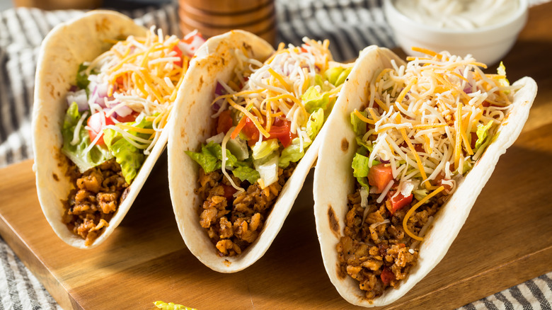 three beef cheese tacos