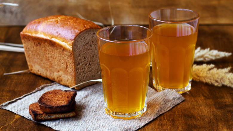 Loaf of bread and two glasses of beer