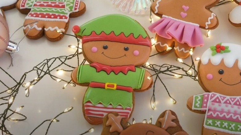 Gingerbread cookie decorated like an elf