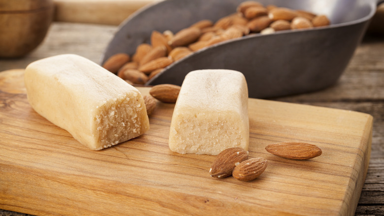 Almond marzipan on wooden board