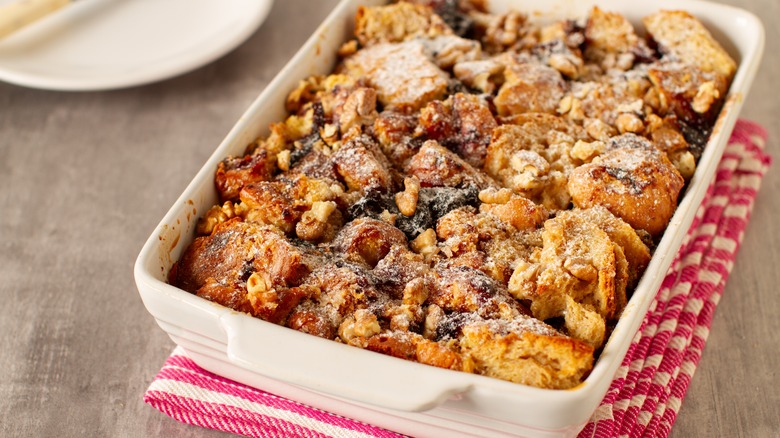 Bread pudding with nuts and powdered sugar