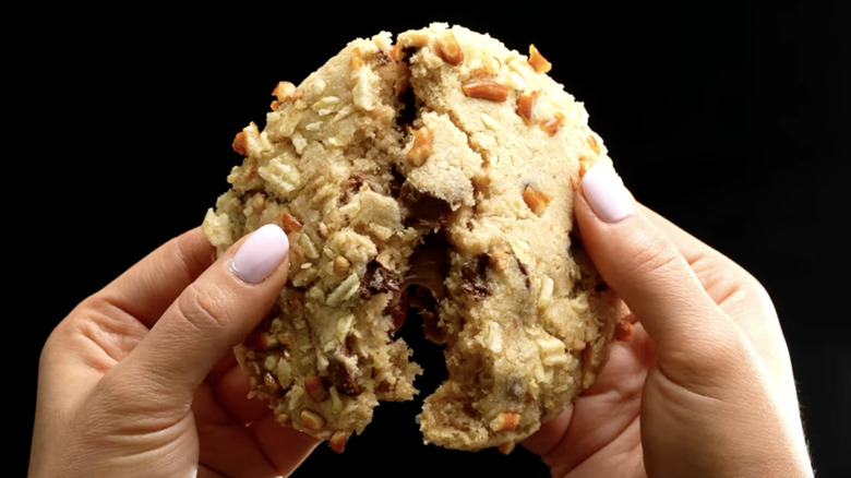 hands splitting kitchen sink cookie