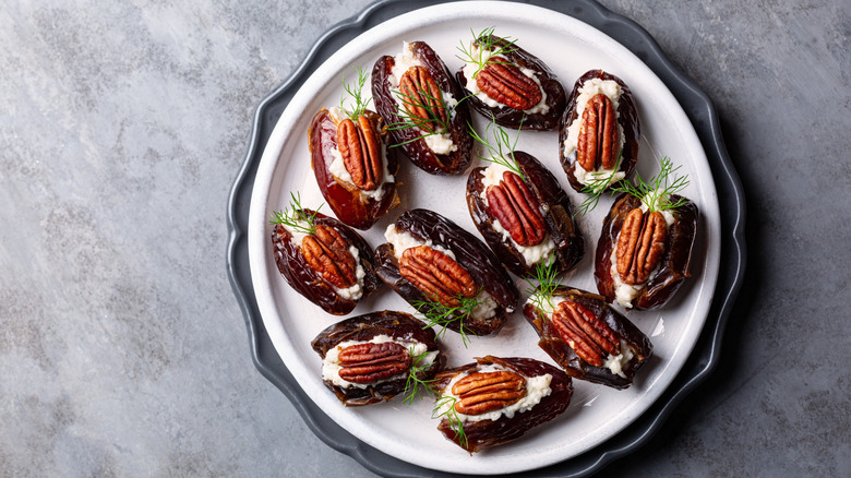 Plate of dates stuffed with cream cheese and pecans