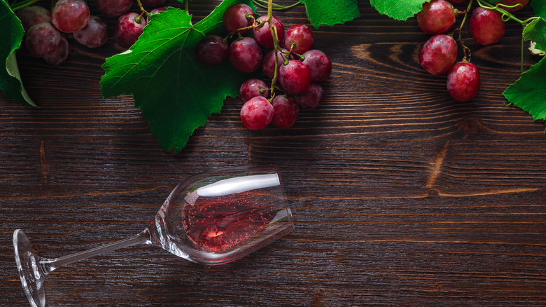 rose bottle and grapes