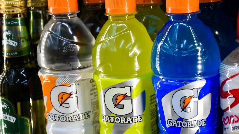 White, yellow and blue Gatorade bottles on a store shelf 