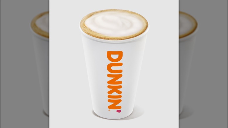 Dunkin' cappuccino in white cup