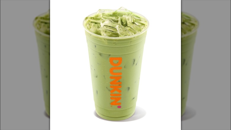 Dunkin' iced matcha latte on white background