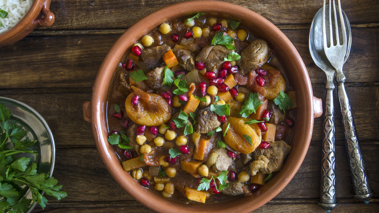 Lamb stew with apricots and chick peas in bowl