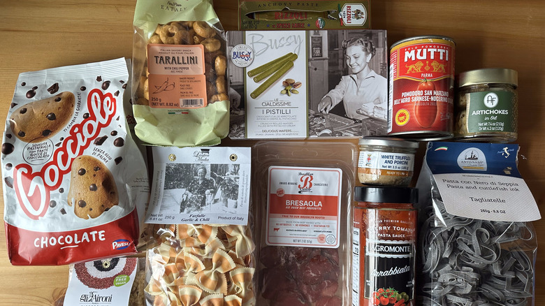 Variety of Eataly products arranged on wooden table