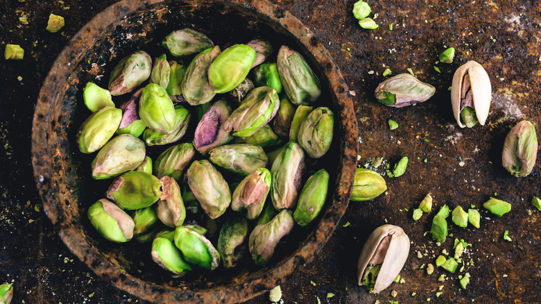 closeup of bowl of shelled pistachios