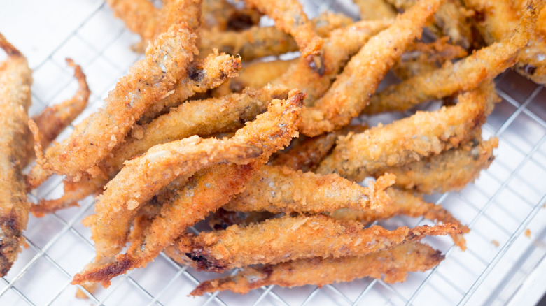 Fried smelts on wire rack