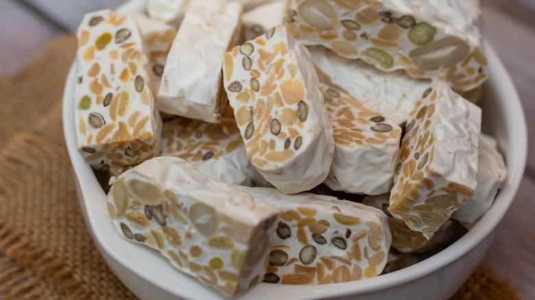 Bowl of tempeh cut up in slices