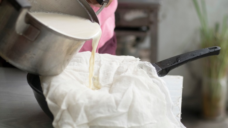 homemade soy milk being strained