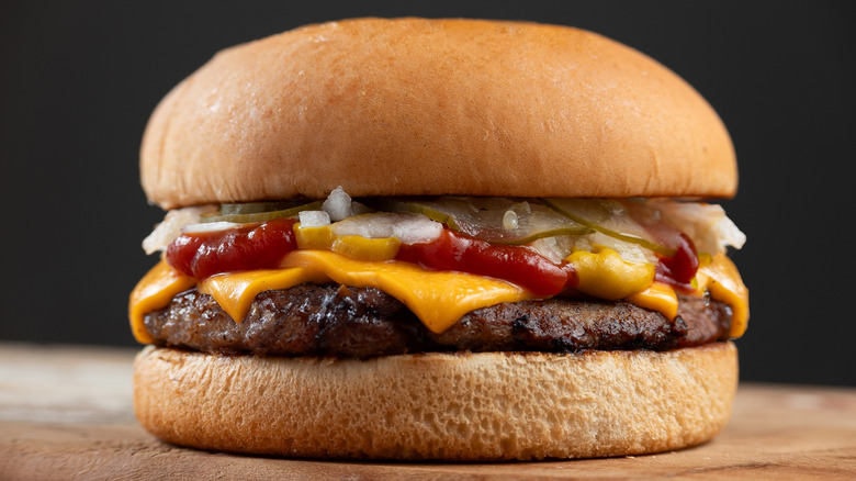 Quarter Pounder cheeseburger on a cutting board