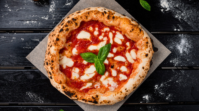 Margherita pizza on wax paper