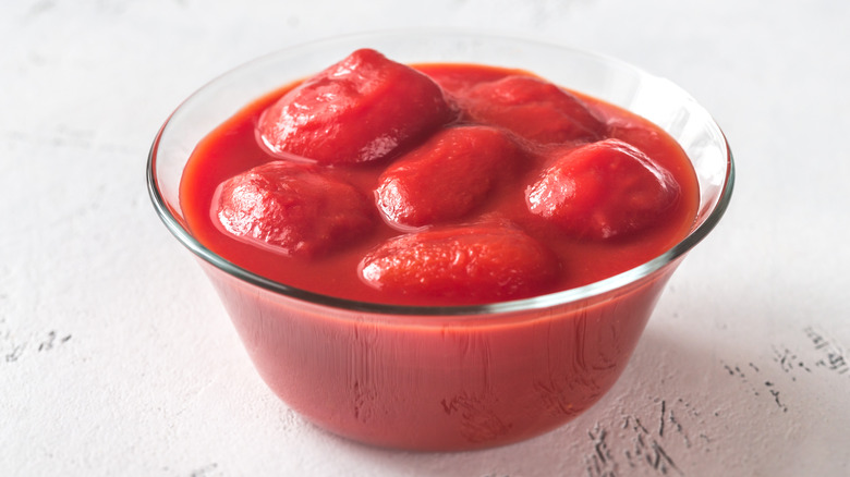 Whole peeled tomatoes in bowl