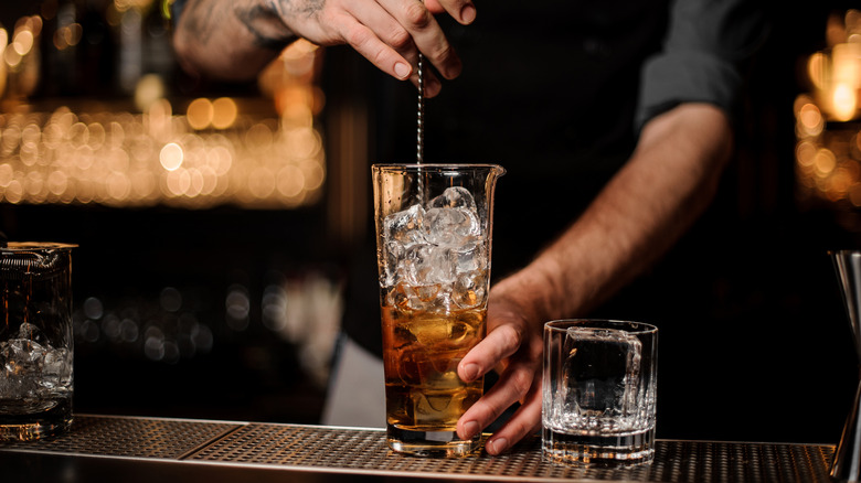 bartender stirring cocktail 