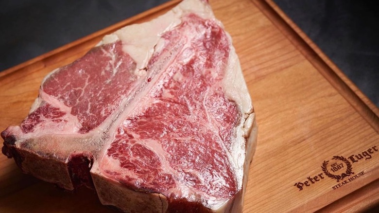 Raw steak on a cutting board