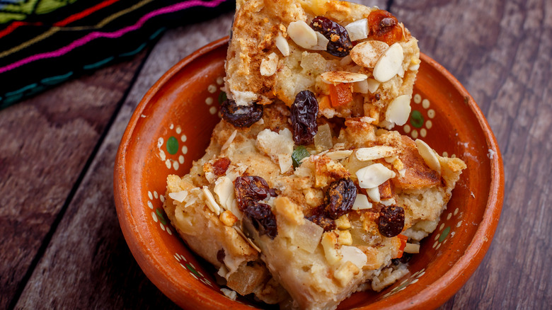 Portion of capirotada bread pudding in bowl