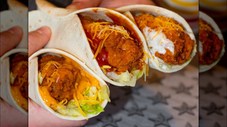 Three Carl's Jr. chicken wraps