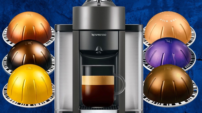 Six pods surrounding a Nespresso Vertuo machine against a blue background