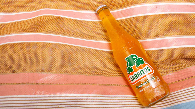 Passion Fruit Jarritos on beach bag